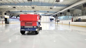 caption: A Zamboni driver polishes the ice at Highland Ice Arena on Wednesday, Oct. 12, 2022.