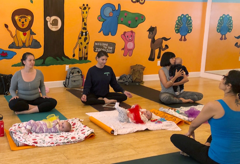 caption: In 2018, U.S. birthrates fell for nearly all racial and age groups, the CDC says. Here, mothers and babies attend a yoga class in Culver City, Calif., in March.