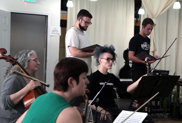 caption: <p>Members of the ensemble the Cult of Orpheus in rehearsal.</p>