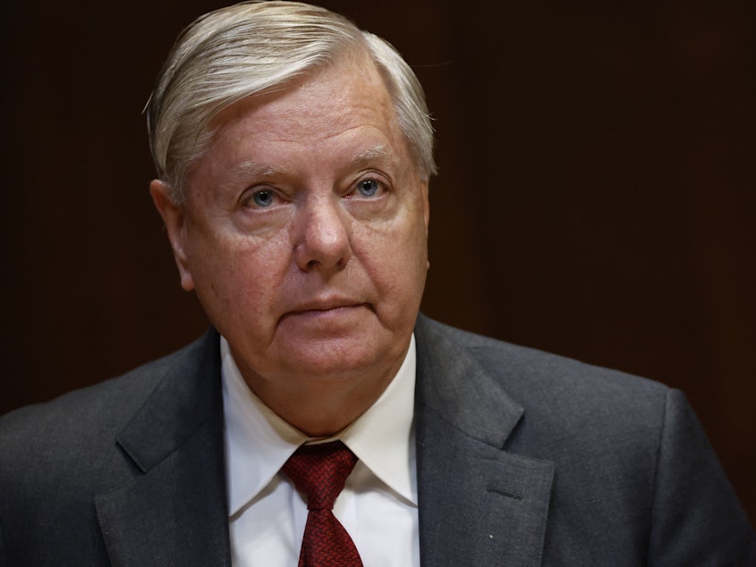 caption: Sen. Lindsey Graham, R-S.C., has been granted a temporary stay of an order to appear before a grand jury in Georgia investigating whether former president Donald Trump and others illegally sought to overturn the election results.