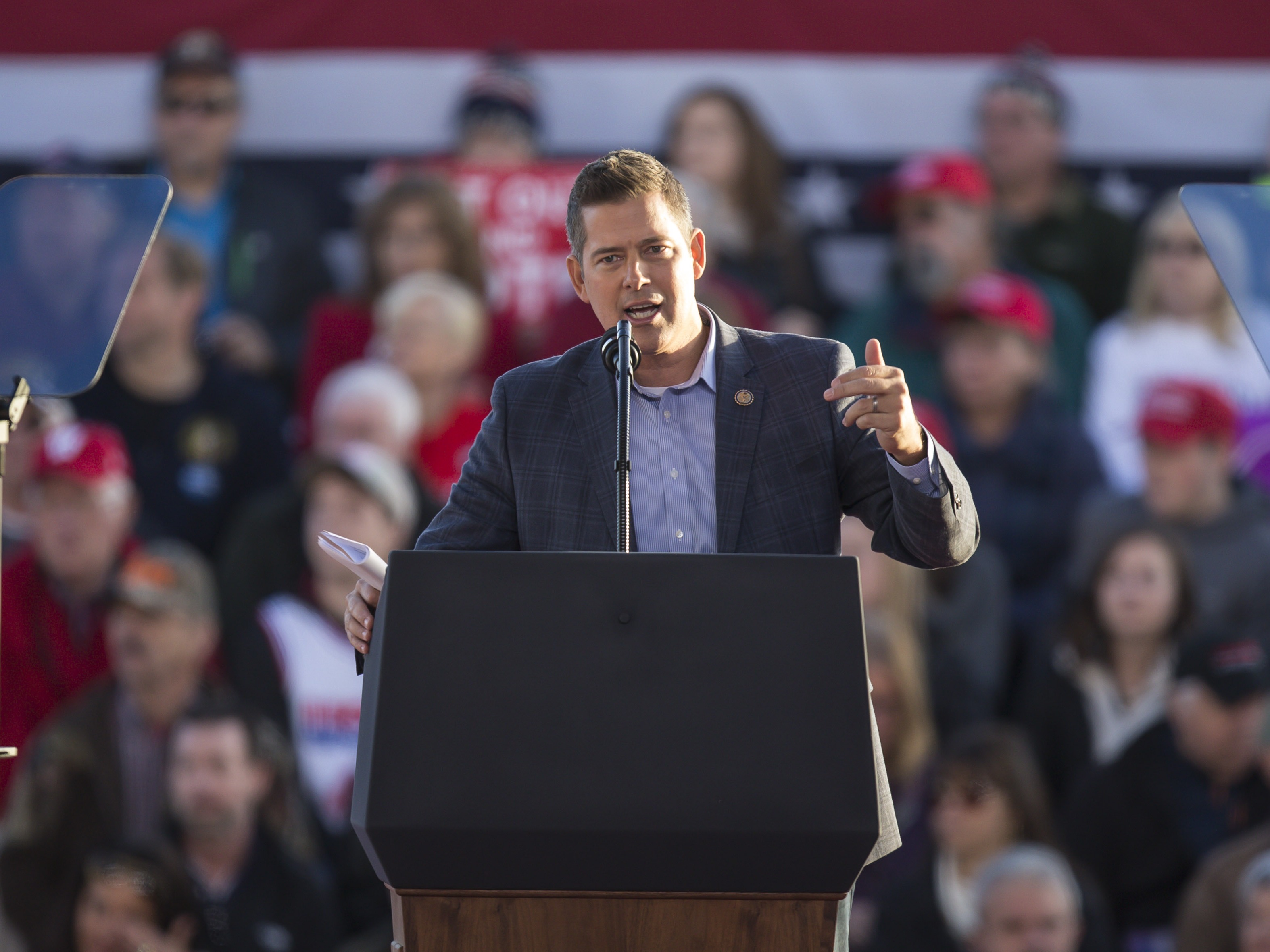 caption: President-Elect Donald Trump has chosen former Wisconsin Congressman Sean Duffy, seen here speaking at a rally in 2018, to be his Department of Transportation Secretary.