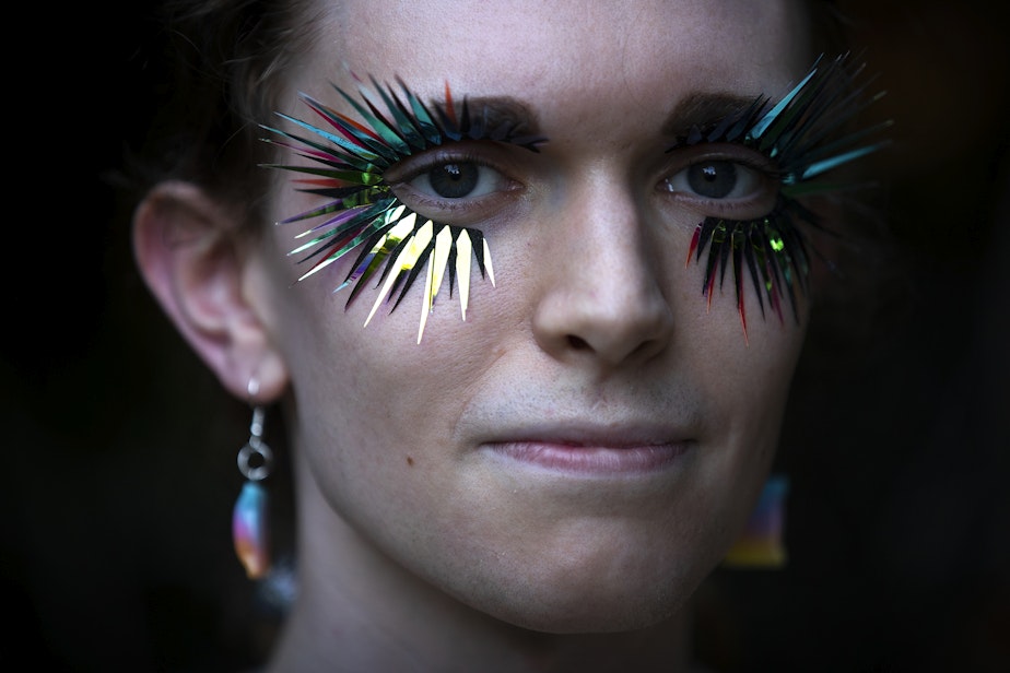 caption: Kathryn Lybeer, 23, is portrayed during Trans Pride Seattle on Friday, June 23, 2023, at Volunteer Park in Seattle. 