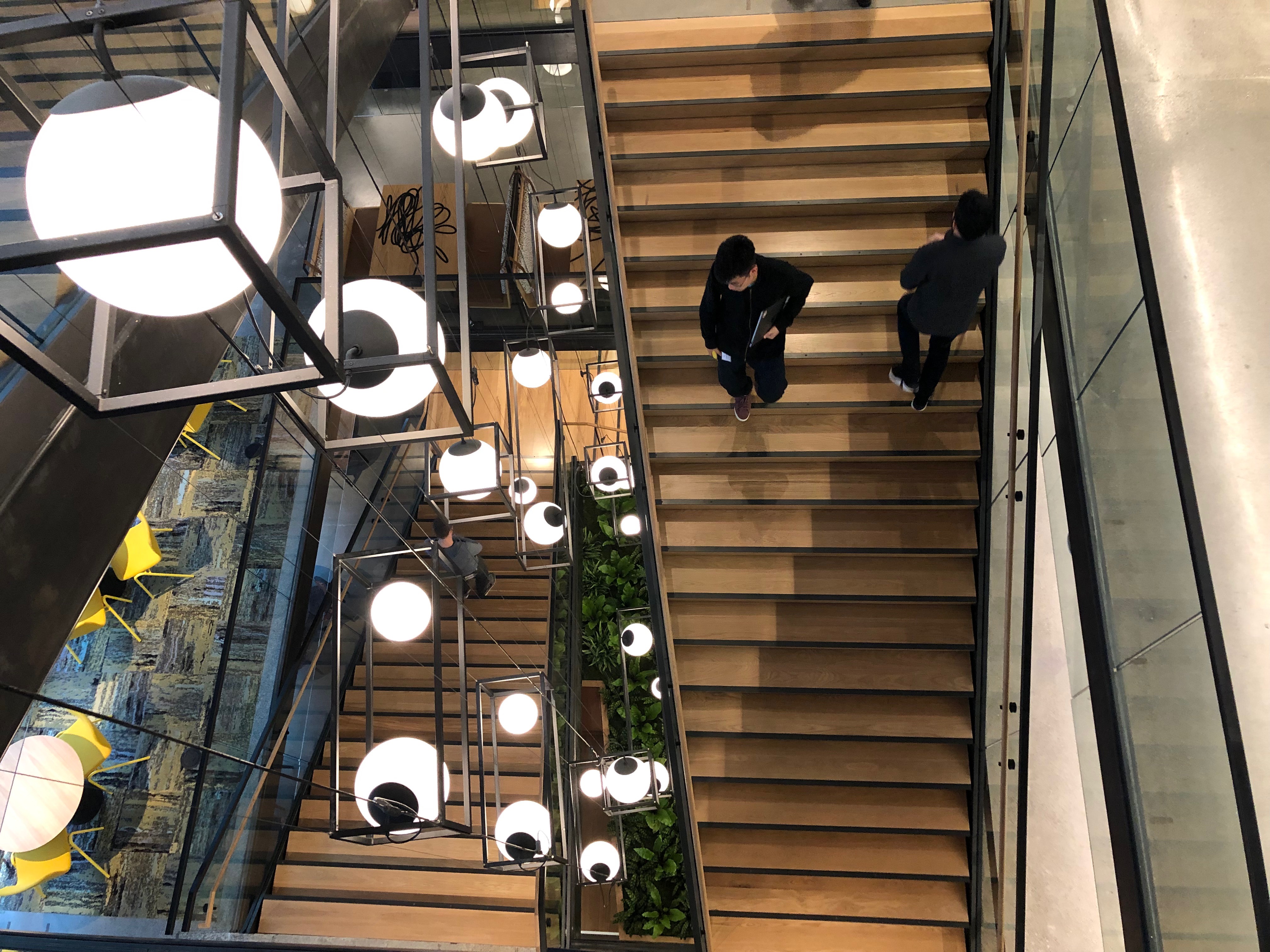 caption: A staircase inside Google's new campus in South Lake Union on Thursday October 3, 2019