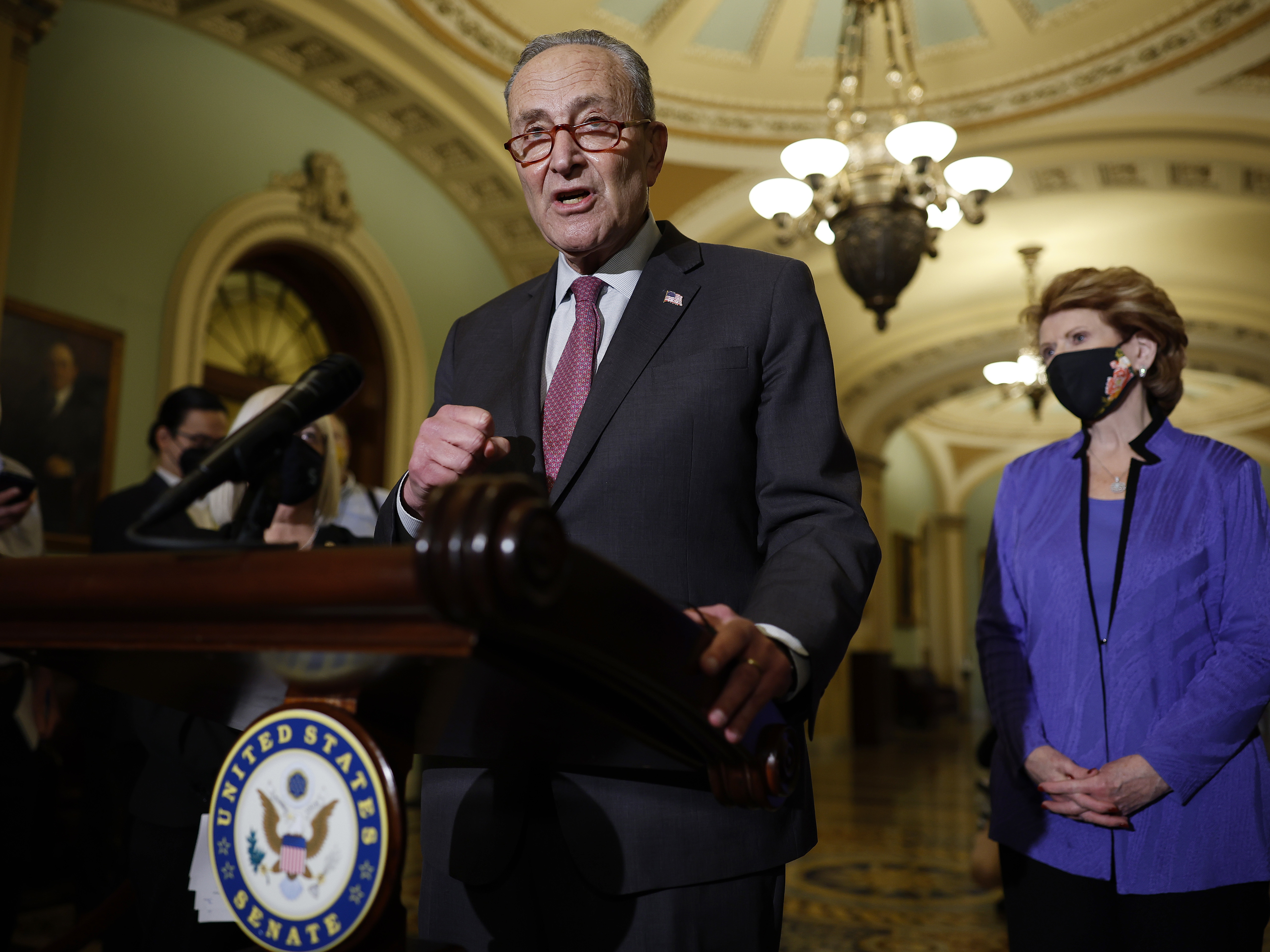 caption: Senate Majority Leader Chuck Schumer, seen here on Dec. 14, announced the Senate will vote on or before Jan. 17 on changing the Senate rules if Republicans block voting rights again.