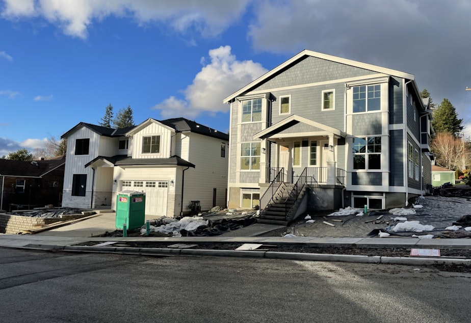 A new duplex, next to a new single family home, in Bothell's Lower Maywood Hill neighborhood