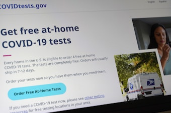 caption: The website COVIDTests.gov allows people to order four at-home tests per residence and have them delivered by mail. Now there's a phone number, too.