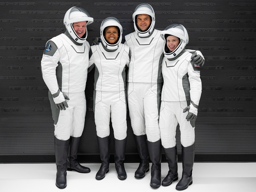 caption: In a first, the SpaceX mission set to launch Wednesday night will carry four civilians: Chris Sembroski (from left), Sian Proctor, Jared Isaacman and Hayley Arceneaux.
