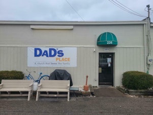 caption: Dad's Place in Bryan, Ohio, offered lodging to homeless people partly in response to the city's housing shortage, according to the church's lawsuit against city officials.
