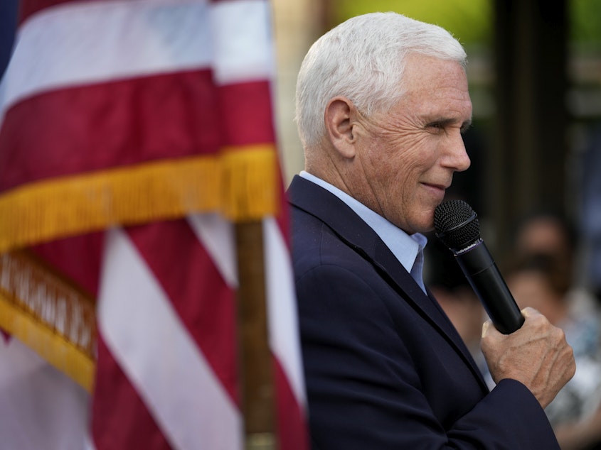 caption: Former Vice President Mike Pence speaks in Des Moines, Iowa, on May 23.