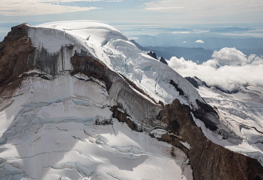 caption: The east face and summit of Washington's Mount Baker on Aug. 28, 2021