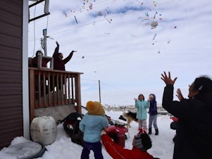 caption: For generations, Yup'ik women have gathered for "throwing parties" in the coastal villages of Western Alaska to celebrate firsts (like the first seal caught by a young family member). In late April, a group of women gathered for a throwing party in the village of Mertarvik to help Mildred Tom celebrate her daughter's graduation and the recent accomplishments of her grandchildren.<br><br> <br>