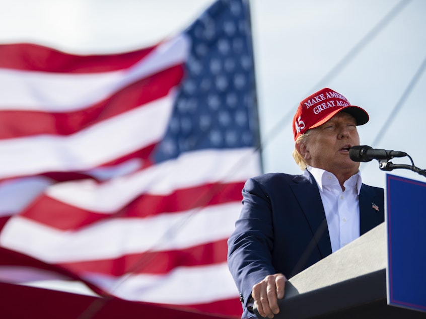 caption: Former President Donald Trump speaks during a campaign rally for Nebraska Republican gubernatorial candidate Charles Herbster on Sunday, in Greenwood, Neb.