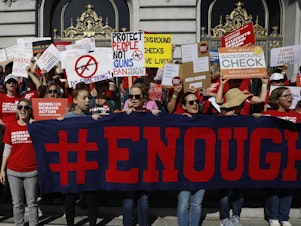 caption: The NRA says San Francisco lawmakers went too far in declaring it a terrorist organization. Here, members of Moms Demand Action for Gun Sense in America take part in a rally against gun violence held at San Francisco City Hall in August.