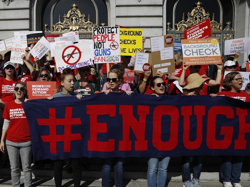 caption: The NRA says San Francisco lawmakers went too far in declaring it a terrorist organization. Here, members of Moms Demand Action for Gun Sense in America take part in a rally against gun violence held at San Francisco City Hall in August.