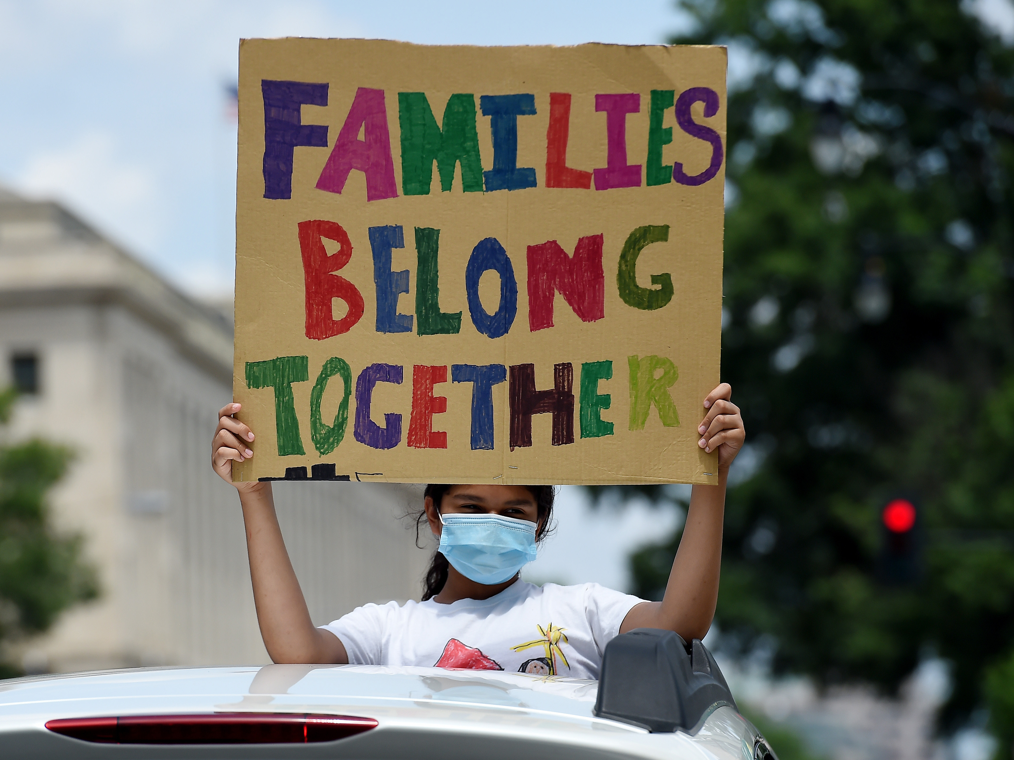 caption: Demonstrators protest outside the Immigration and Customs Enforcement headquarters in Washington, D.C., in July 2020 to demand the release of people in detention centers.