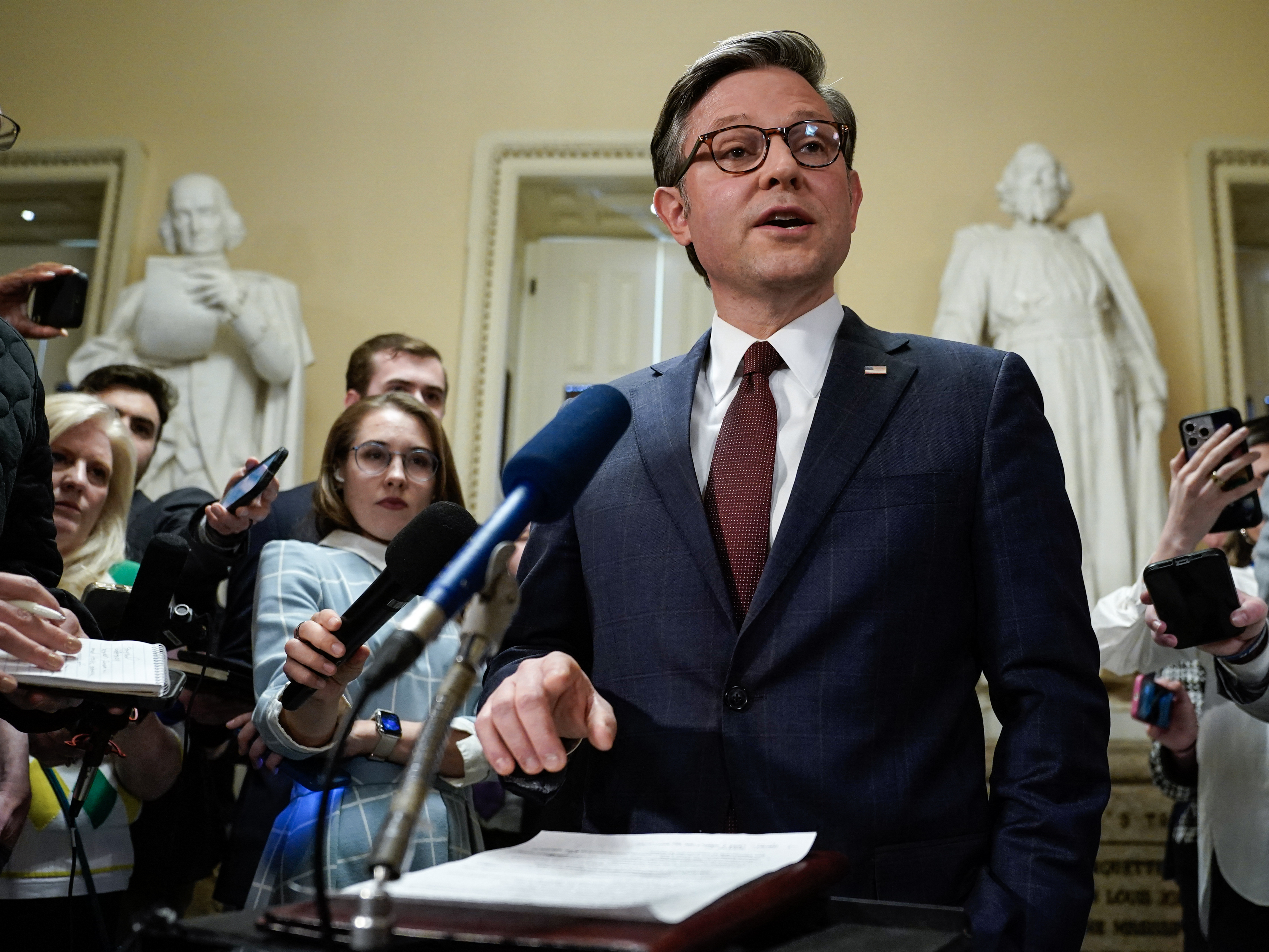 caption: Speaker of the House Mike Johnson speaks to the press after the chamber passed a major aid package for Ukraine, Israel, and Taiwan on April 20.