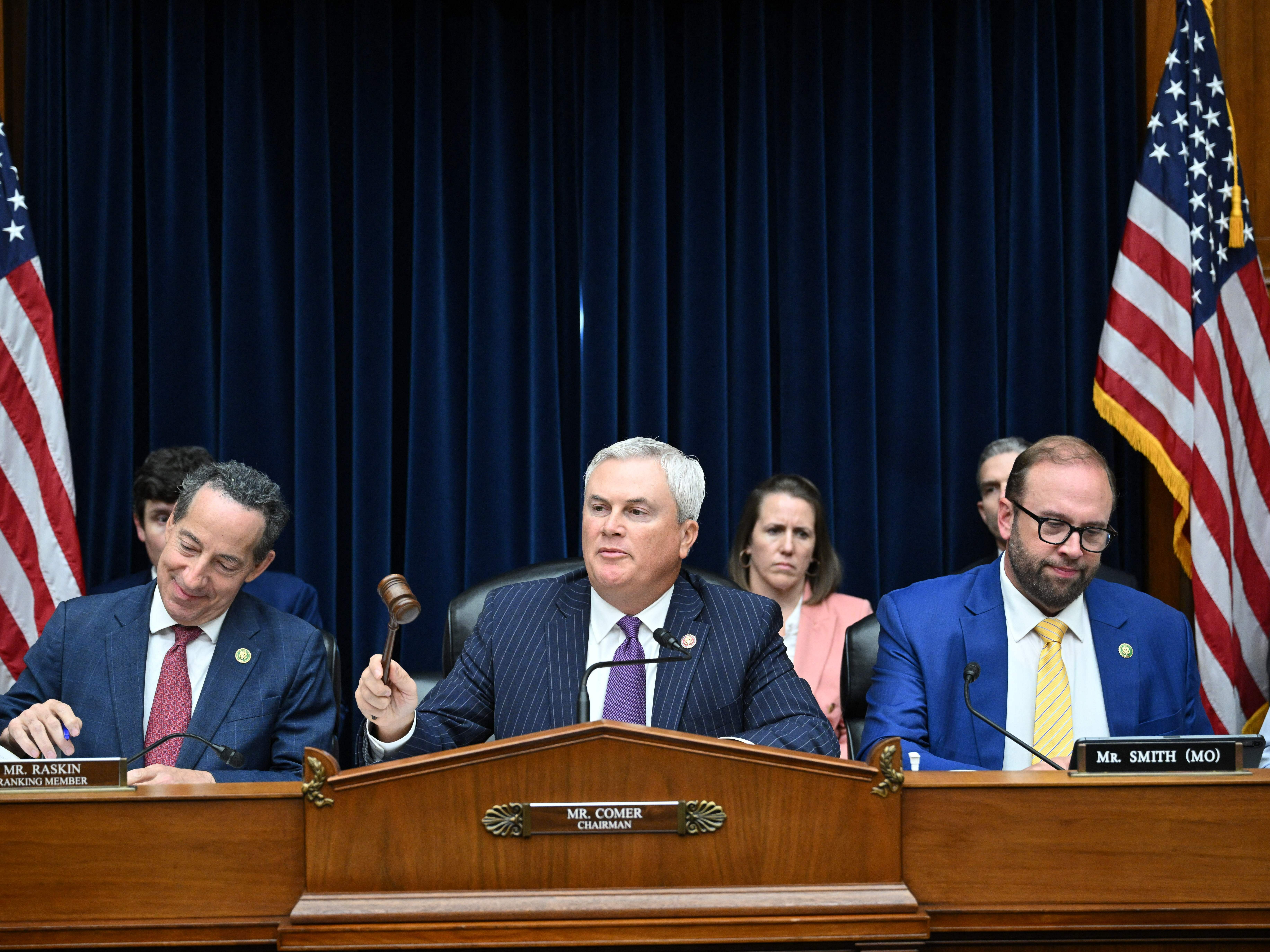 caption: Rep. Jamie Raskin (at right), Rep. James Comer, chairman of the House Oversight Committee (center) and Rep. Jason Smith during a House Committee on Oversight and Accountability impeachment inquiry hearing of President Biden on Thursday.