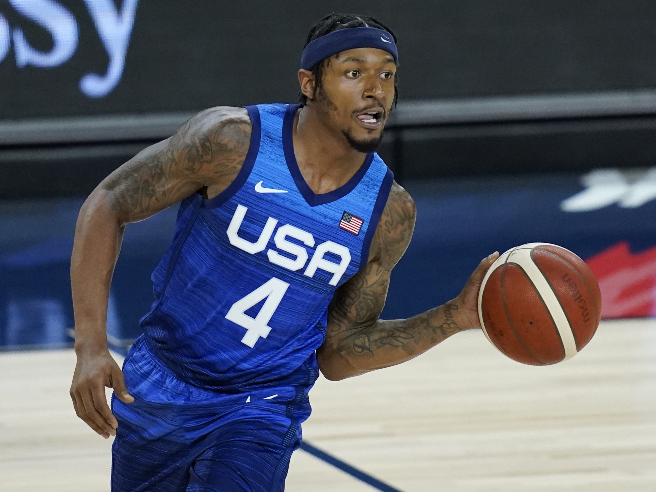 caption: U.S. basketball player Bradley Beal appears in an exhibition game against Australia on Monday in Las Vegas. Beal tested positive for the coronavirus and will not be going to the Tokyo Olympic Games.