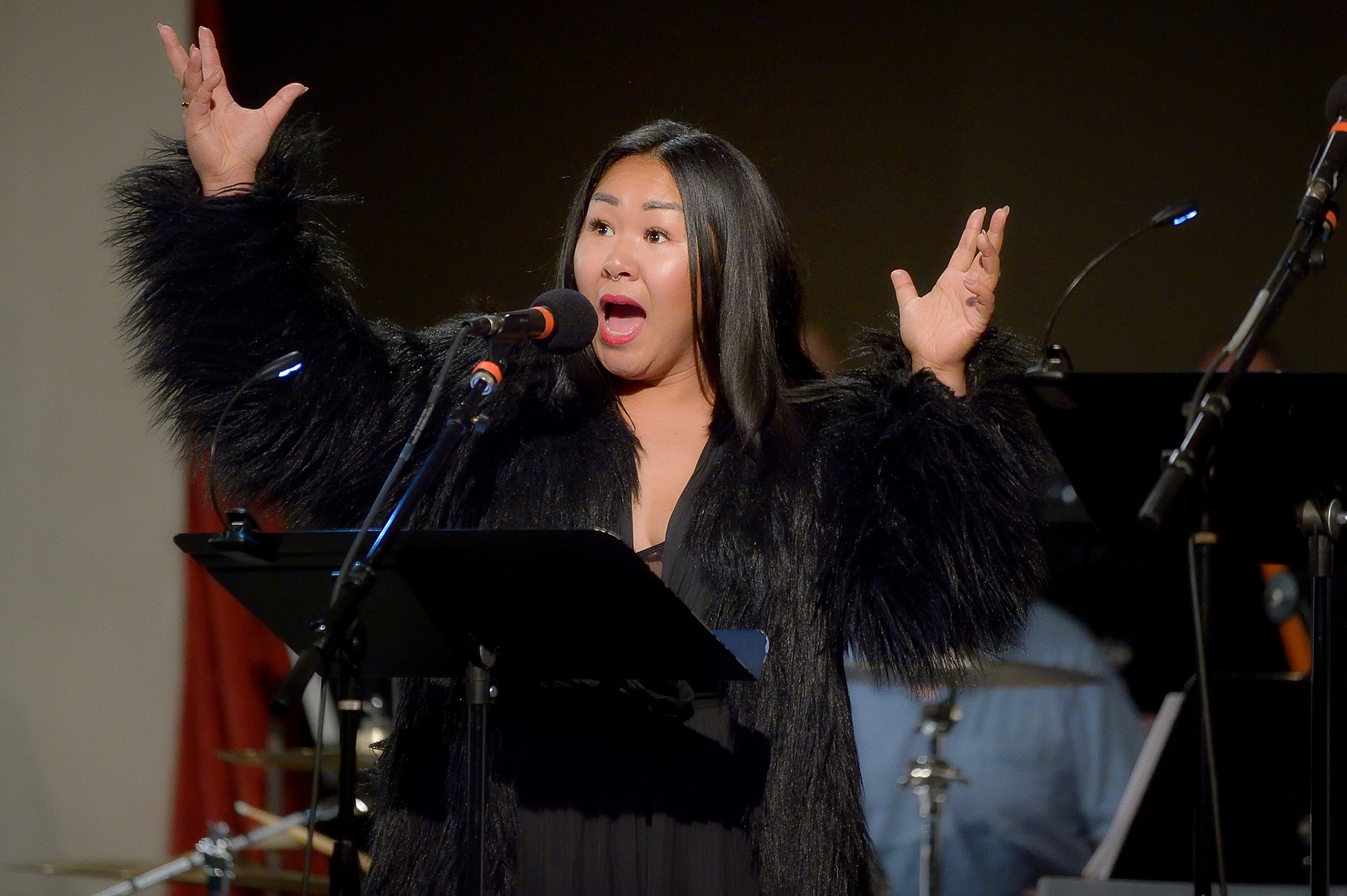 caption: 'Everything I did to my children....I did to them to make them stronger!' Dragon Lady Sara Porkalob at Town Hall Seattle