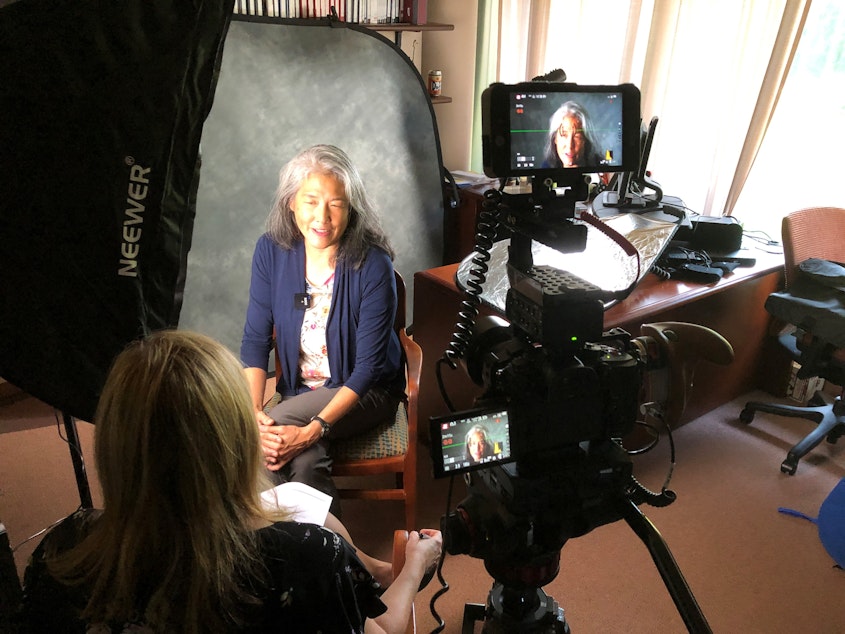 caption: KUOW's Deborah Wang is interviewed by Carter Center staff at the conclusion of her Rosalynn Carter Mental Health Journalism Fellowship. 