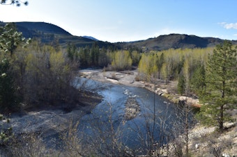 caption: The Chewuch River and the former Wagner Ranch, in April 2022, shortly before it was returned to the Confederated Colville Tribes.