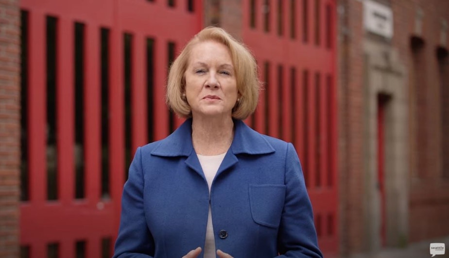 caption: Seattle Mayor Jenny Durkan delivers a brief address about her final city budget proposal as mayor on September 27, 2021.