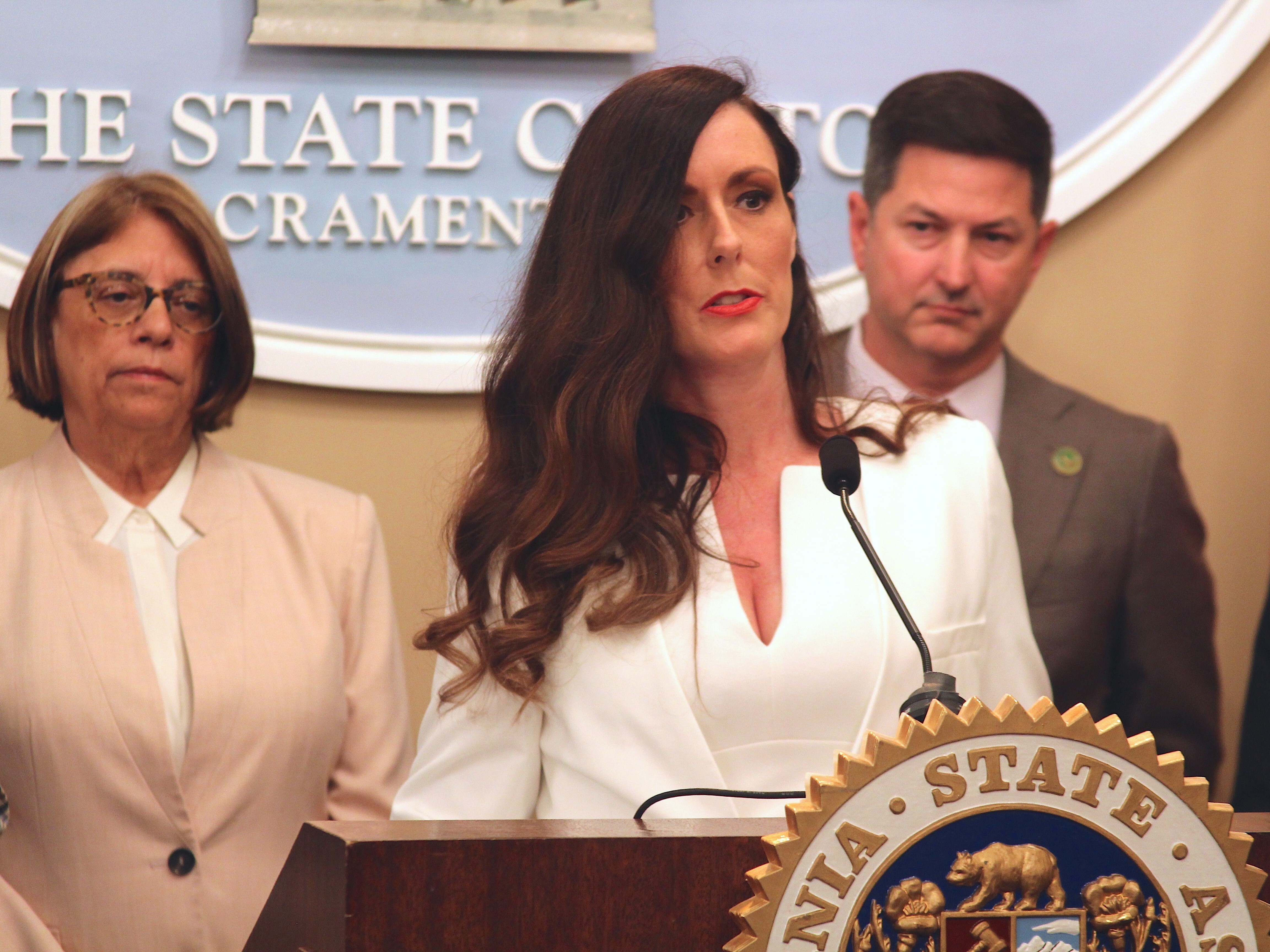 caption: Victoria Burke discusses proposed protections for victims of assault and abuse during a 2023 news conference in California.