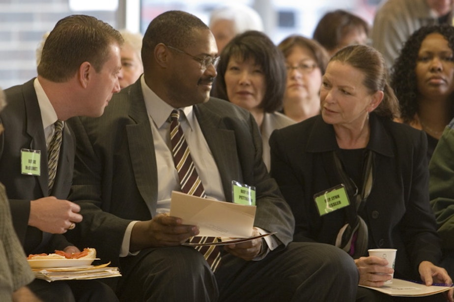 caption: Former Rep. Joe McDermott, Rep. Eric Pettigrew and former Rep. Lynn Kessler at an event in 2006.