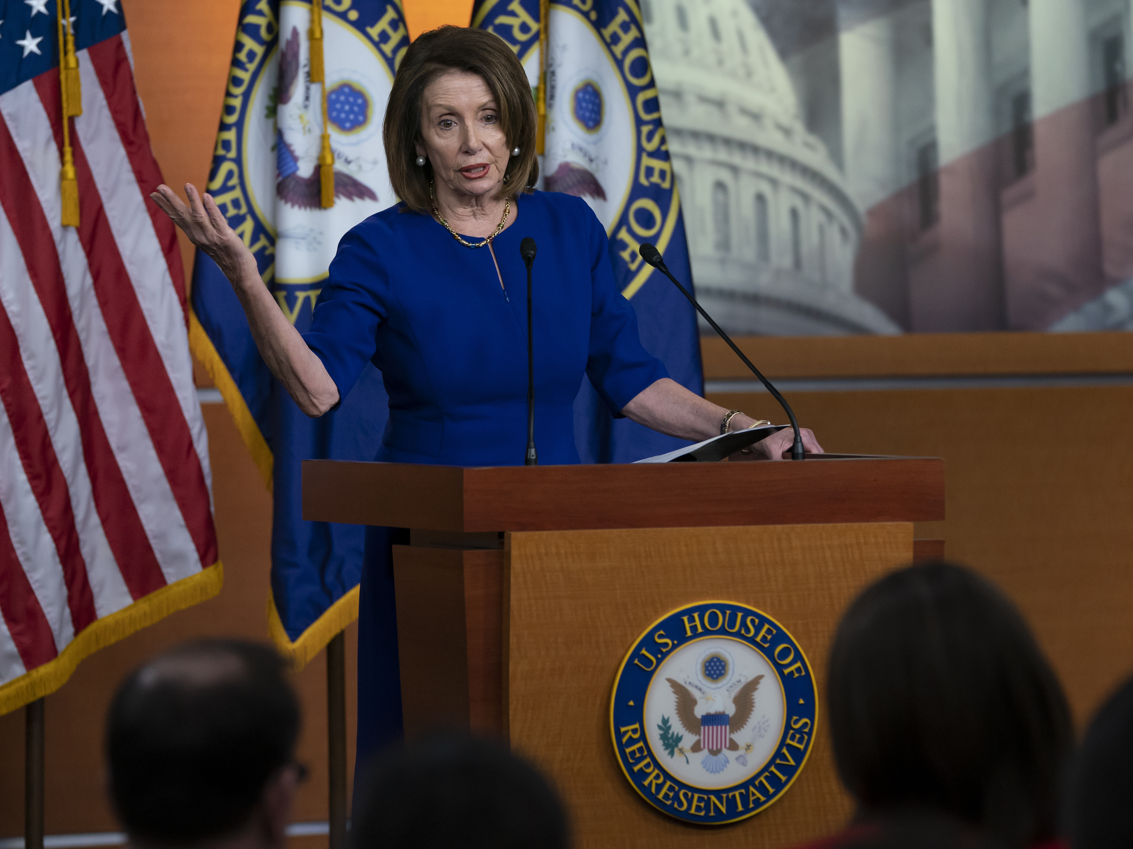 caption: House Speaker Nancy Pelosi meets with reporters for her weekly news conference at the Capitol on Thursday.