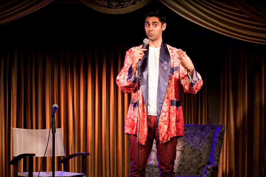 caption: Hasan Minhaj performs at the Goatface Experience in Los Angeles.