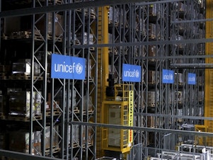 caption: UNICEF said Monday it plans to stockpile 520 million syringes in its warehouses in preparation for an eventual COVID-19 vaccine. This warehouse in Copenhagen, Denmark, is part of the agency's infrastructure to deliver medical supplies around the world.