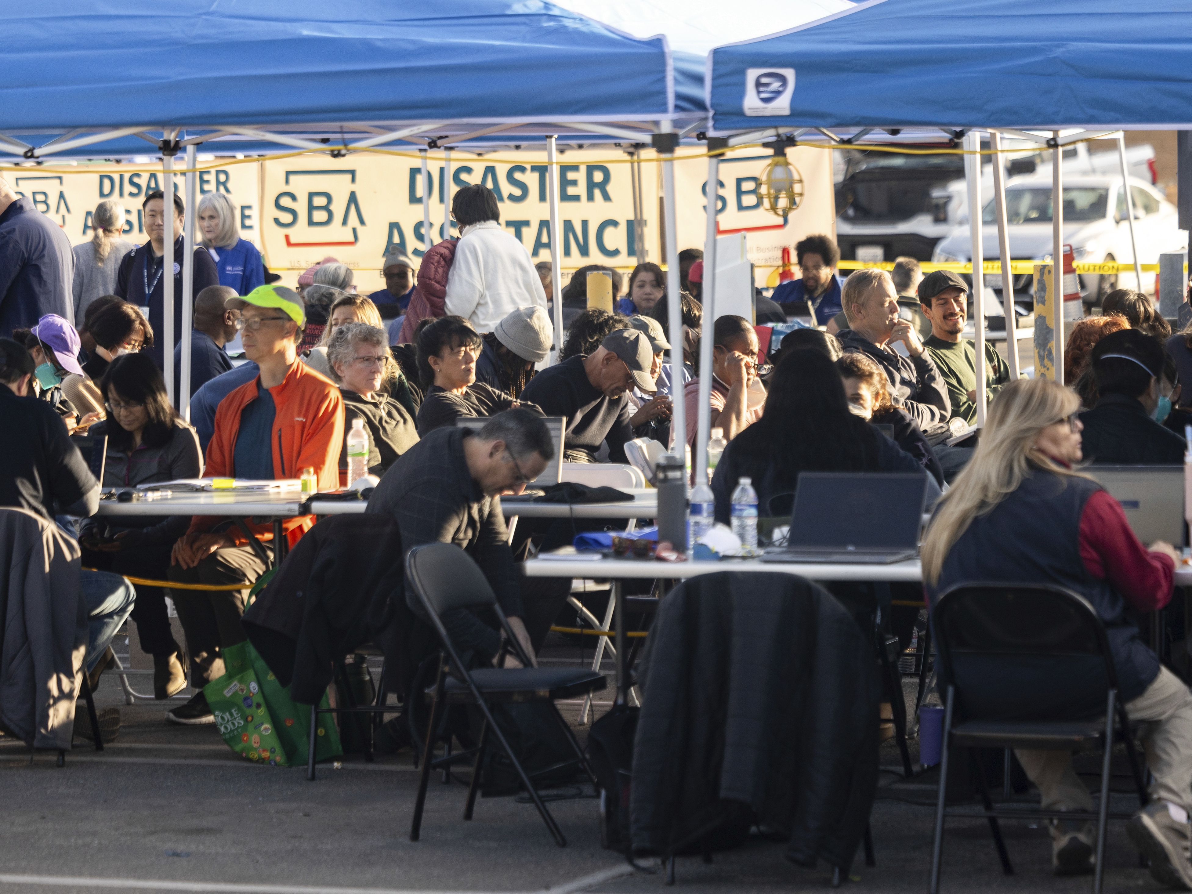 caption: People impacted by wildfires in 2025 seek information and relief at a FEMA Disaster Recovery Center in Pasadena, Calif. The president has said the Federal Emergency Management Agency, FEMA, should be eliminated, and has appointed a group of high level officials to recommend options for restructuring or reforming the agency.