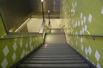 caption: A stairway descends into Capitol Hill’s light rail station – and away from cell service.
