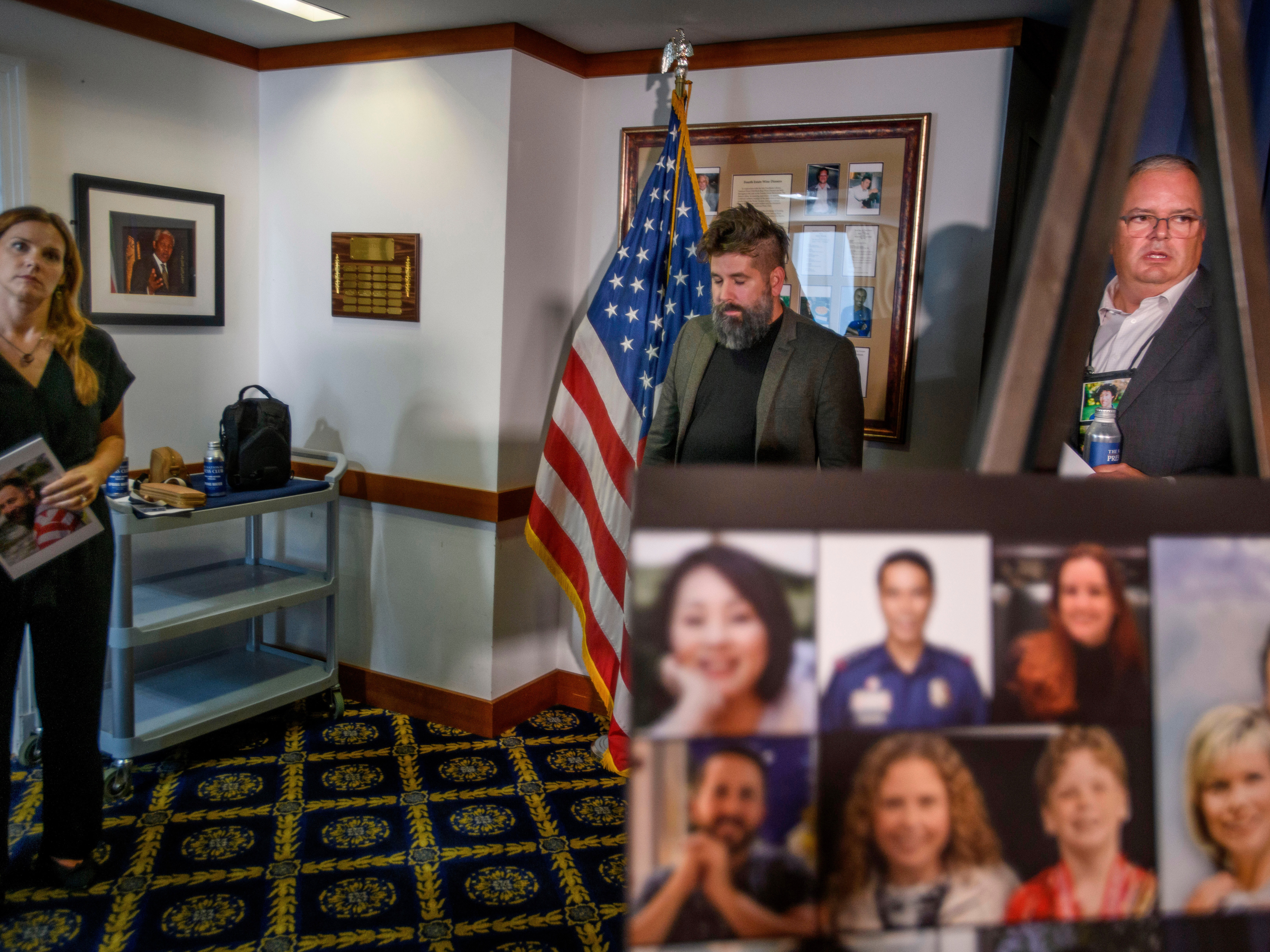 caption: Rachel Crafton, left, wife of Casey Crafton, and Dailey Crafton, center, brother of Casey Crafton who perished on American Eagle flight 5342, are joined by Doug Lane, right, whose wife and son also died on the flight, prepare to talk with reporters Wednesday regarding a lawsuit over the Jan. 29, 2025, mid-air collision with a U.S. Army Black Hawk Helicopter.