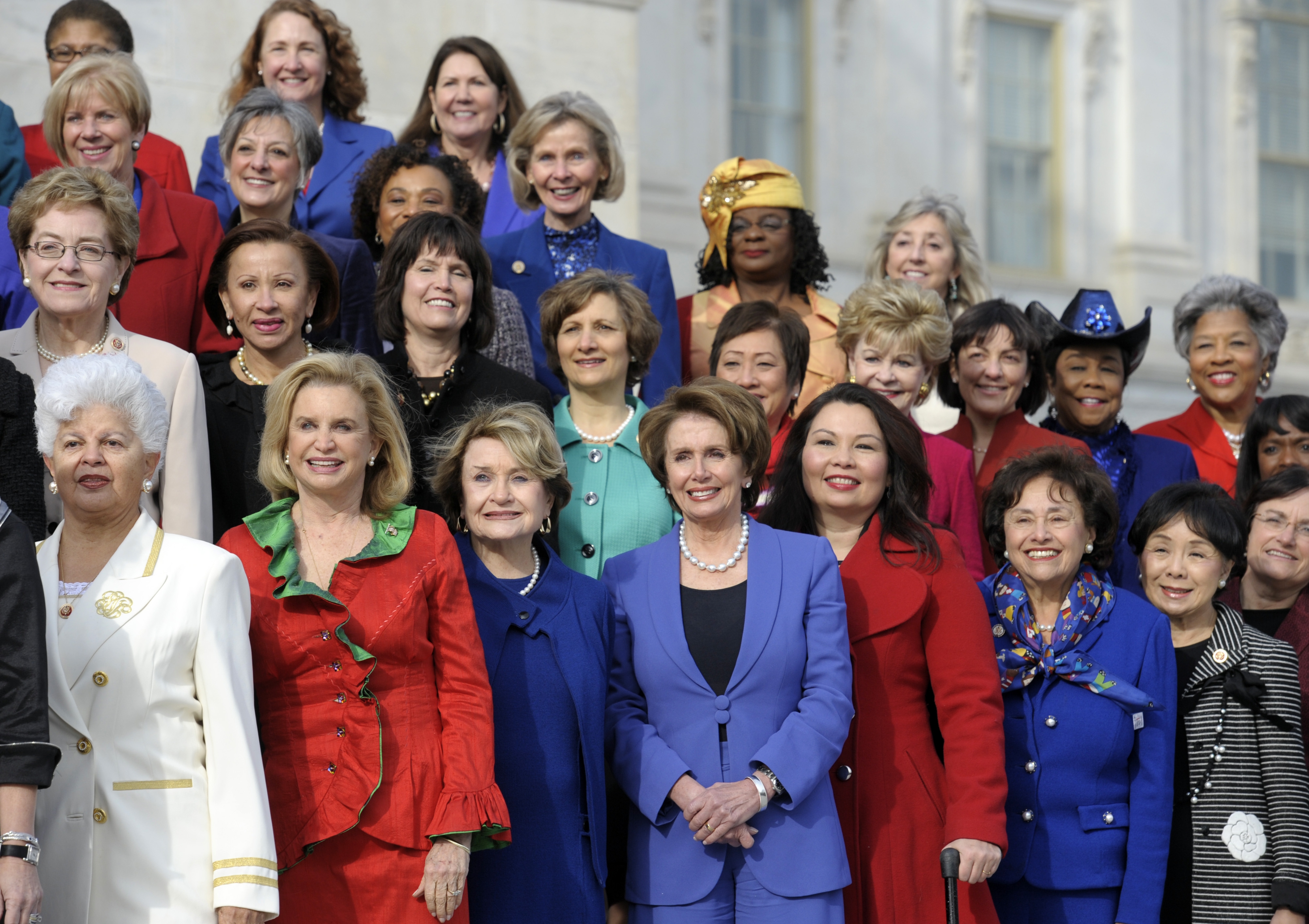 caption: Female House members on the steps of the House on Capitol Hill in Washington, D.C.  Jan. 3, 2013, prior to the official opening of the 113th Congress.