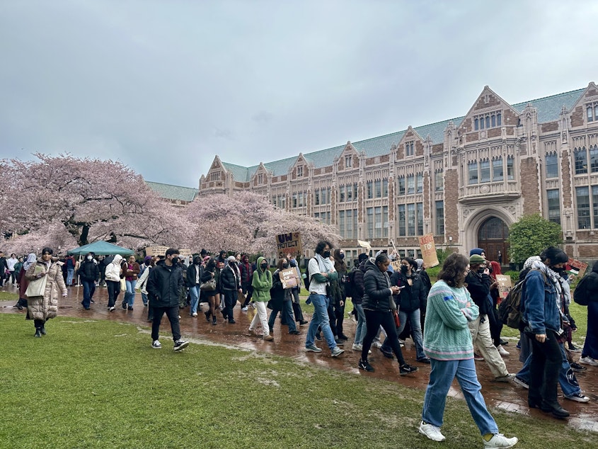 caption: University of Washington students marched to the administrative building during a protest March 28, 2024. 