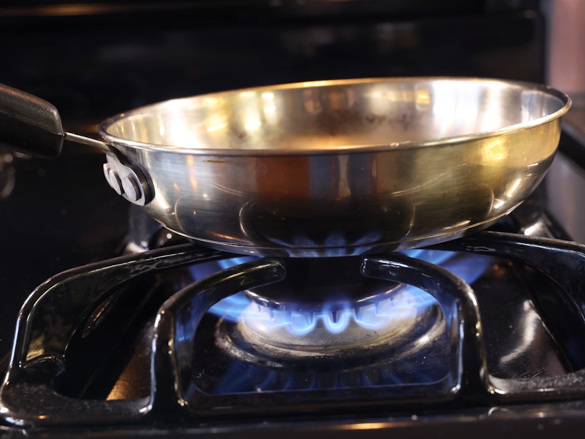 caption: An interview with a federal official set off a culture war fight after he suggested regulators might put stricter scrutiny on gas cooking stoves due to health concerns.