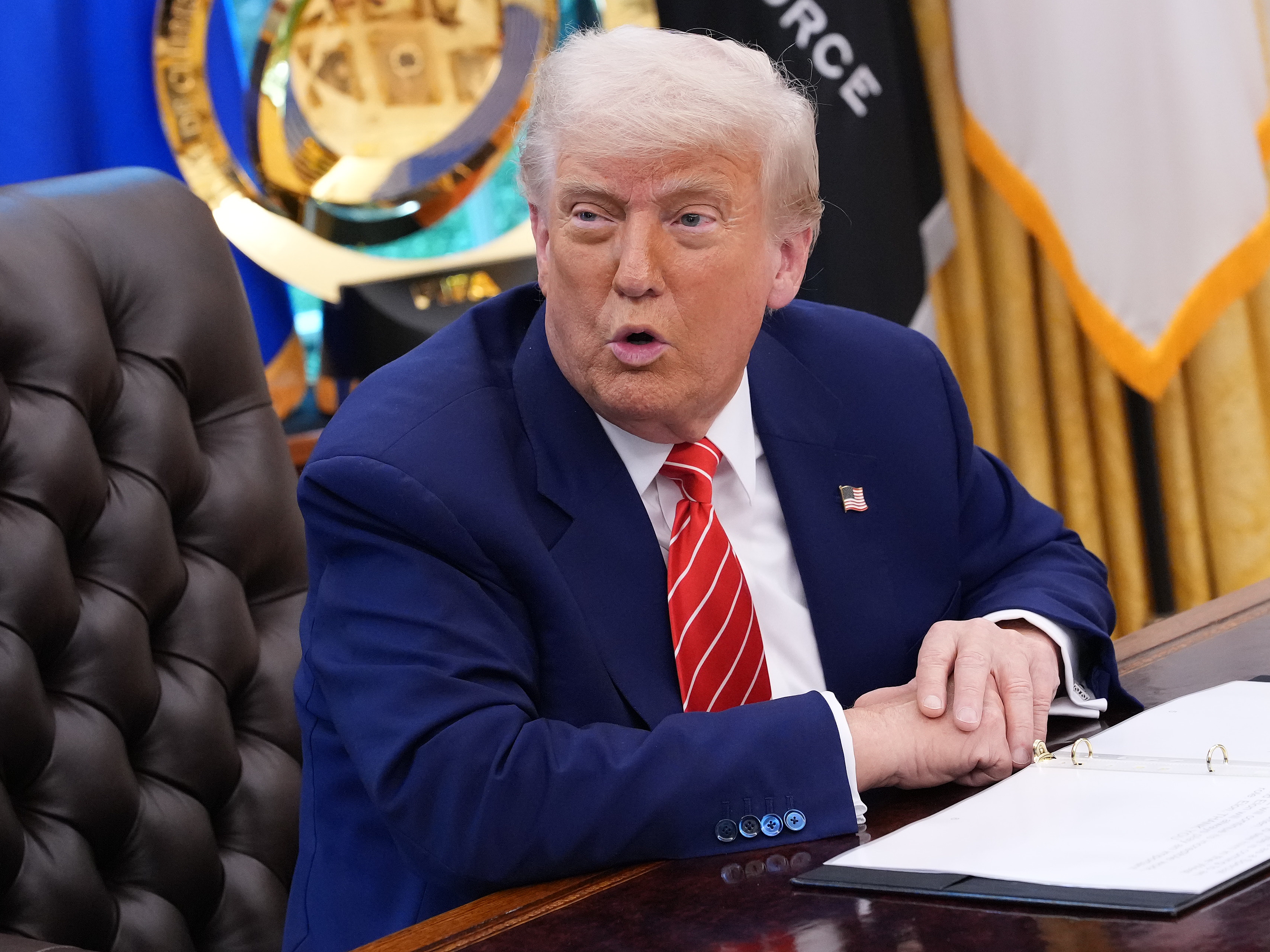 caption: President Trump speaks to reporters in the Oval Office of the White House on May 30.