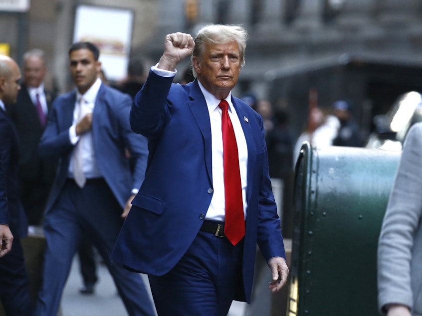 caption: Former US President Donald Trump departs after speaking to the press after attending the civil fraud trial against the Trump Organization in New York State Supreme Court, in New York City on January 11, 2024.