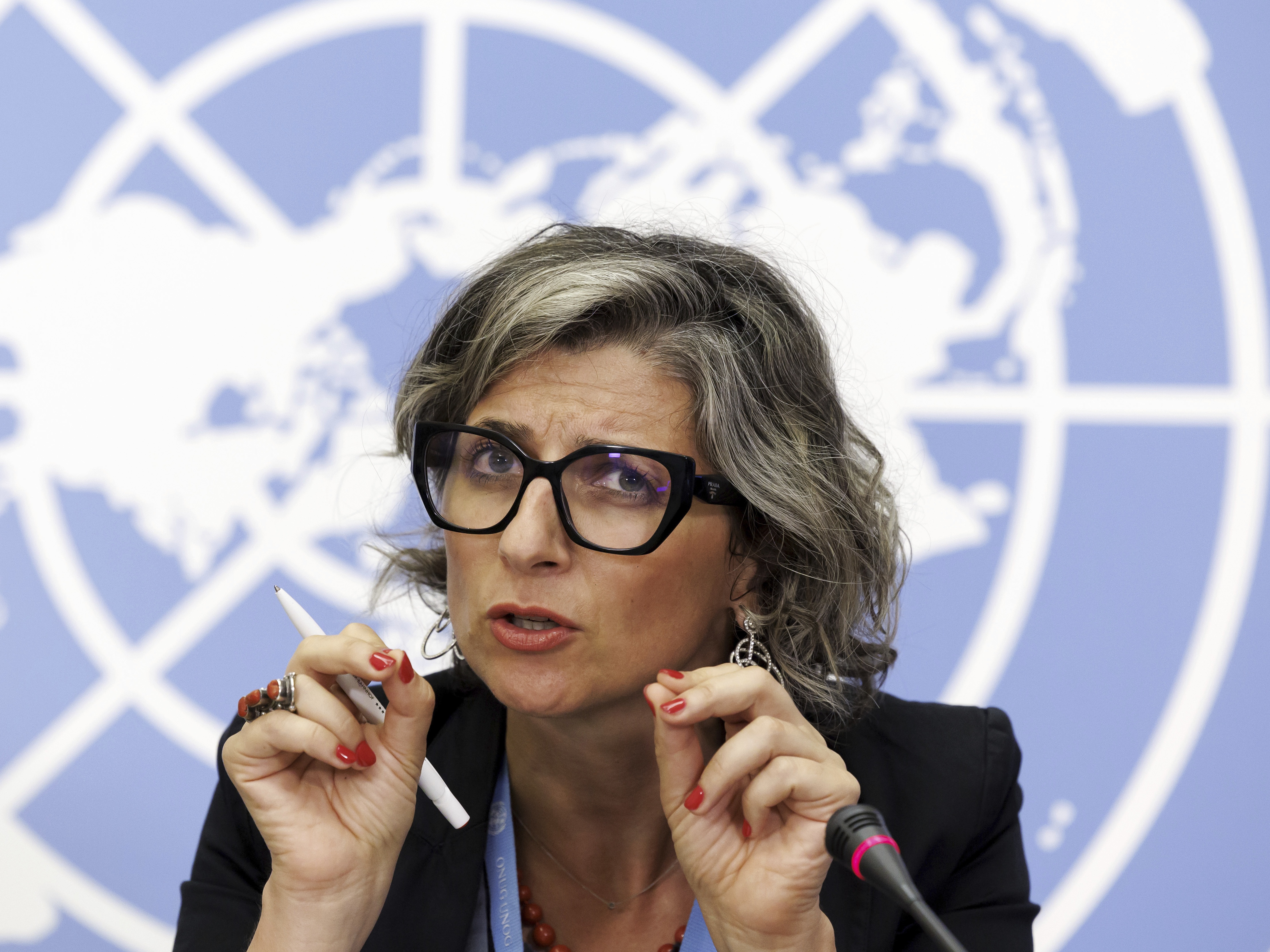 caption: Francesca Albanese, Special Rapporteur on the situation of human rights in the Palestinian territories occupied since 1967, talks to the media during a press conference at the European headquarters of the United Nations in Geneva, Switzerland, July 11, 2023.