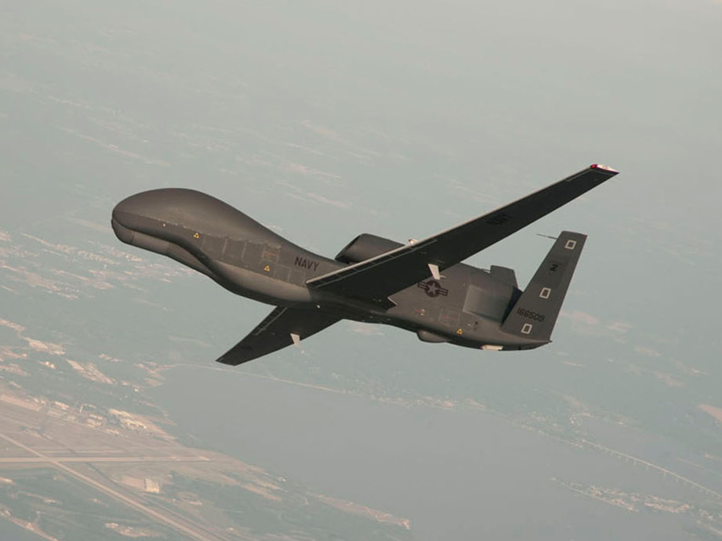 caption: An RQ-4 Global Hawk drone conducting tests in Maryland in a U.S. Navy handout from 2017. On Thursday, Iran's Revolutionary Guard says it shot down a similar drone in southern Iran.