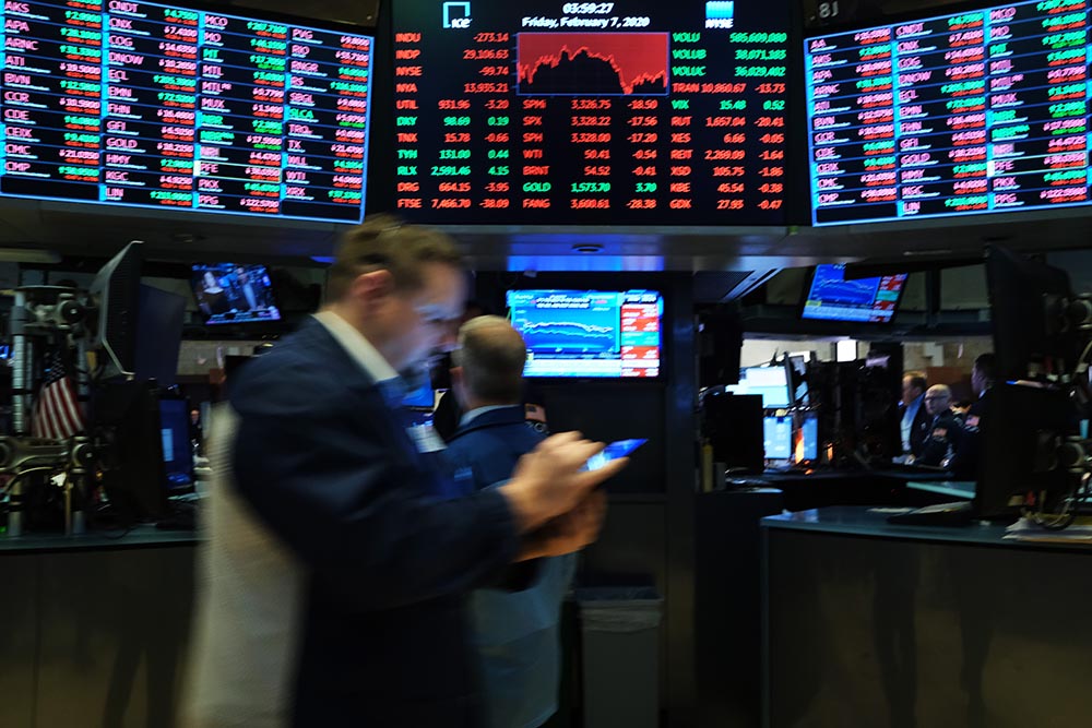 caption: Traders work on the floor of the New York Stock Exchange (NYSE) on February 07, 2020 in New York City. As concern continues over the global economic impact from the Coronavirus, stocks fells over 200 points.  (Spencer Platt/Getty Images)