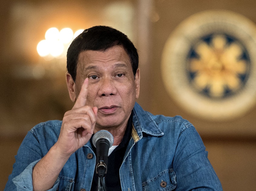 caption: Investigators will focus on the period from 2016, when Philippine President Rodrigo Duterte took office, through March 2019, after which the Philippines was deemed to have withdrawn from the International Criminal Court in a bid to avert its jurisdiction.