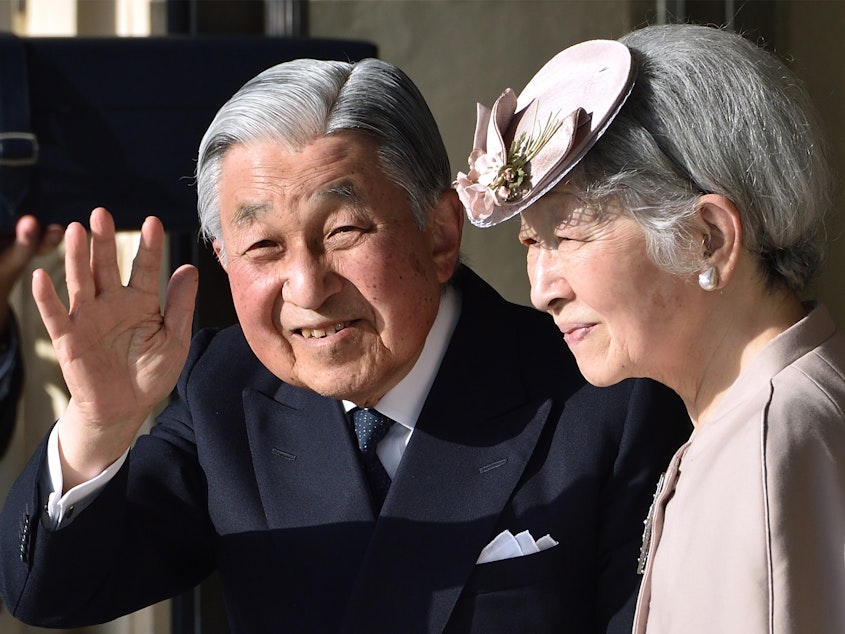 caption: Japan's Emperor Akihito, with Empress Michiko, waves to well-wishers in the central Japanese prefecture of Mie on April 18. Emperor Akihito takes part in a series of rituals ahead of his abdication.