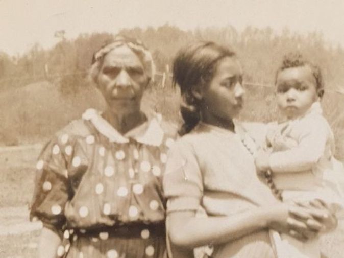 caption: Mary Stepp Burnette Hayden, pictured around 1942, with her granddaughter, Mary Othella Burnette, and two of Hayden's great-grandchildren.