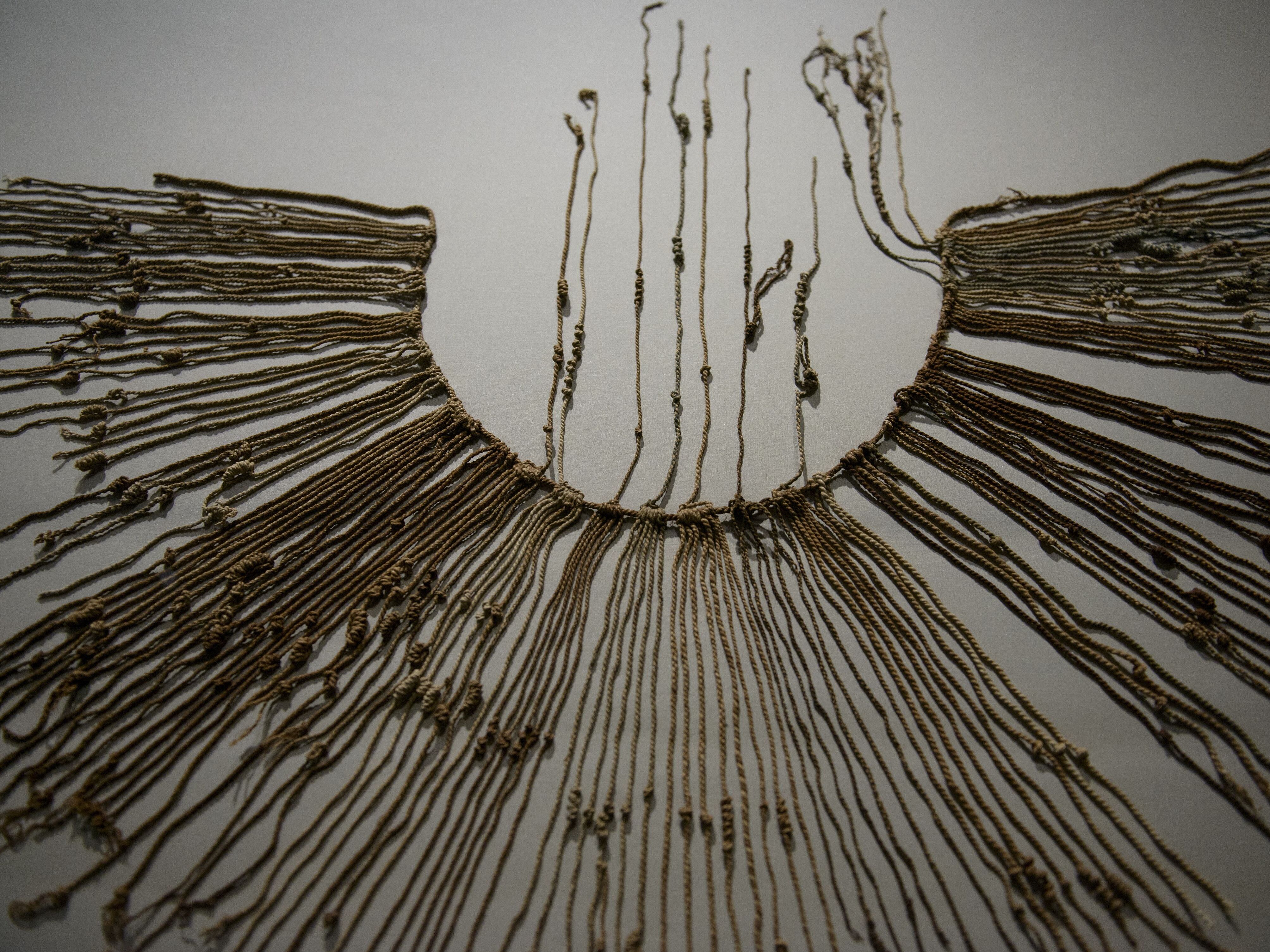 caption: A cotton and agave fiber Inca khipu is seen at an exhibit at the Smithsonian National Museum of the American Indian in 2015 in Washington, D.C.