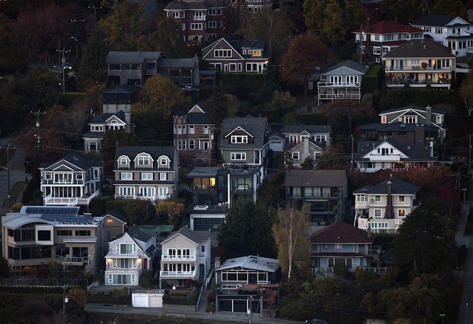 caption: Homes in Queen Anne are shown from the Space Needle on Monday, November 6, 2017, in Seattle. 