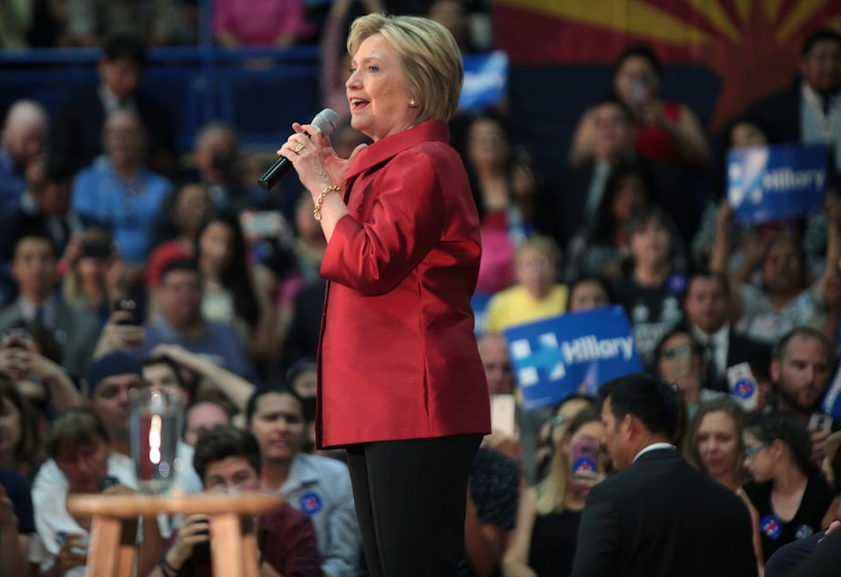 caption: Hillary Clinton speaking with supporters at a campaign rally at Carl Hayden High School in Phoenix, Arizona in March 2016.