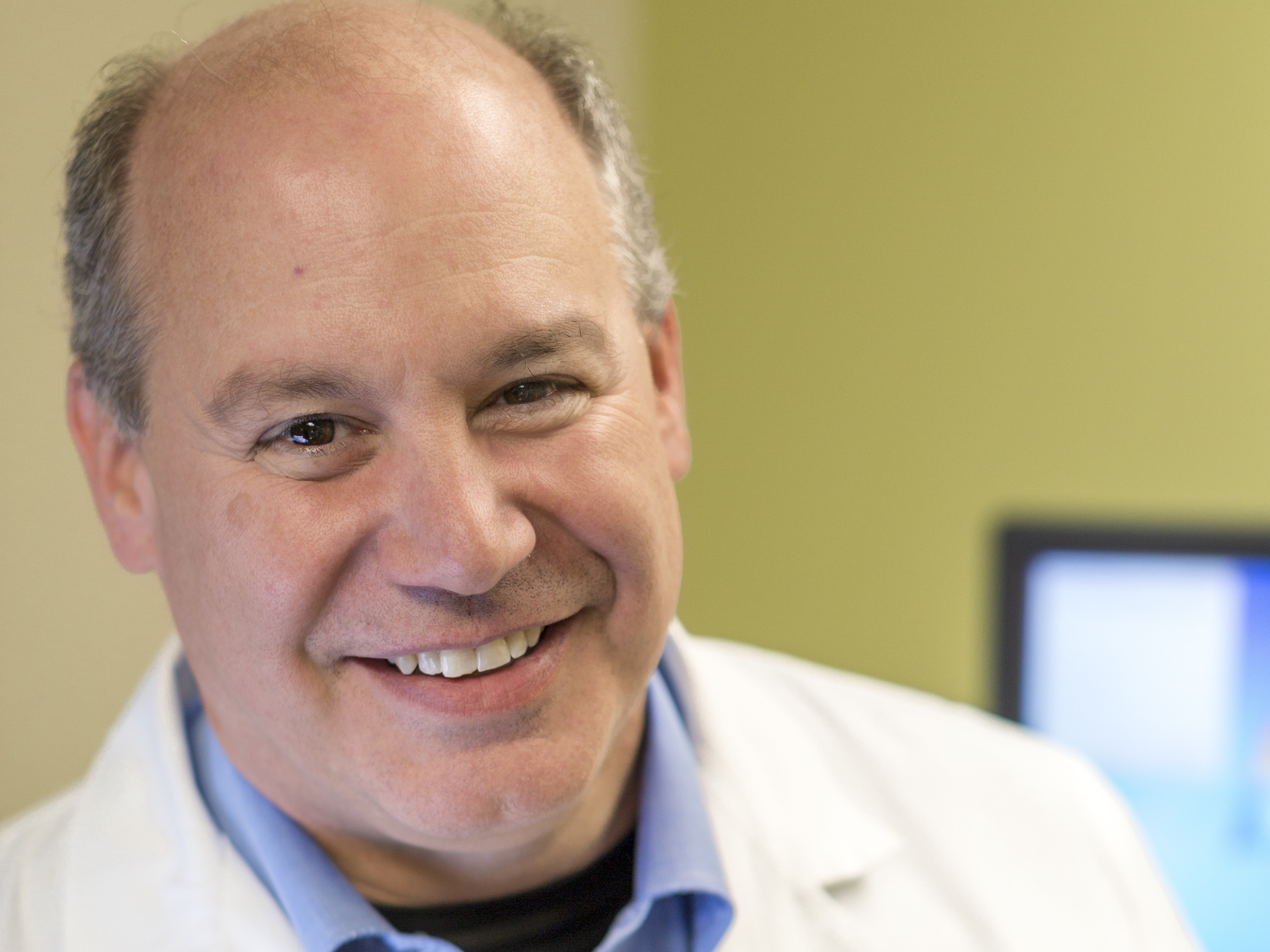 caption: Dr. Michael Saag, seen at his clinic at the University of Alabama, Birmingham.
