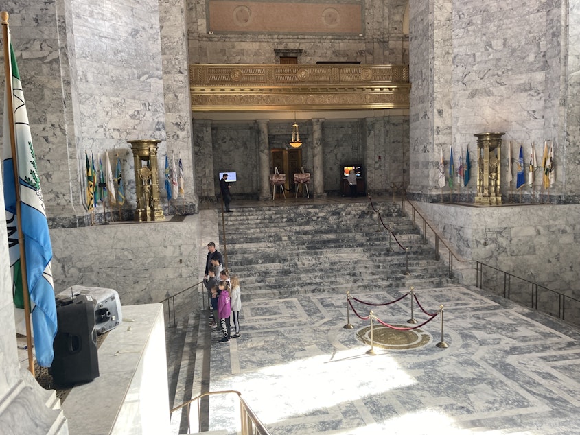 caption:  Except for a few visitors and lobbyists, the rotunda of the Washington state Capitol was quiet on the last day of the 2022 session. For the second year in a row, the session was held mostly remotely due to COVID. 